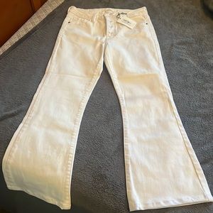 Button fly, white jeans